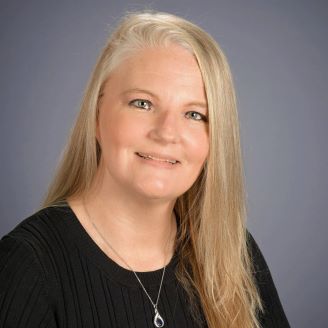 Julie Eikenberry, Our Center Director